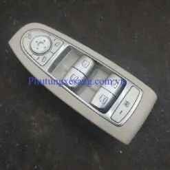 Công tắc nâng kính cửa trước Mercede